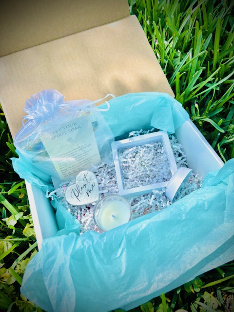 Legacy Box opened to reveal tissue-wrapped contents